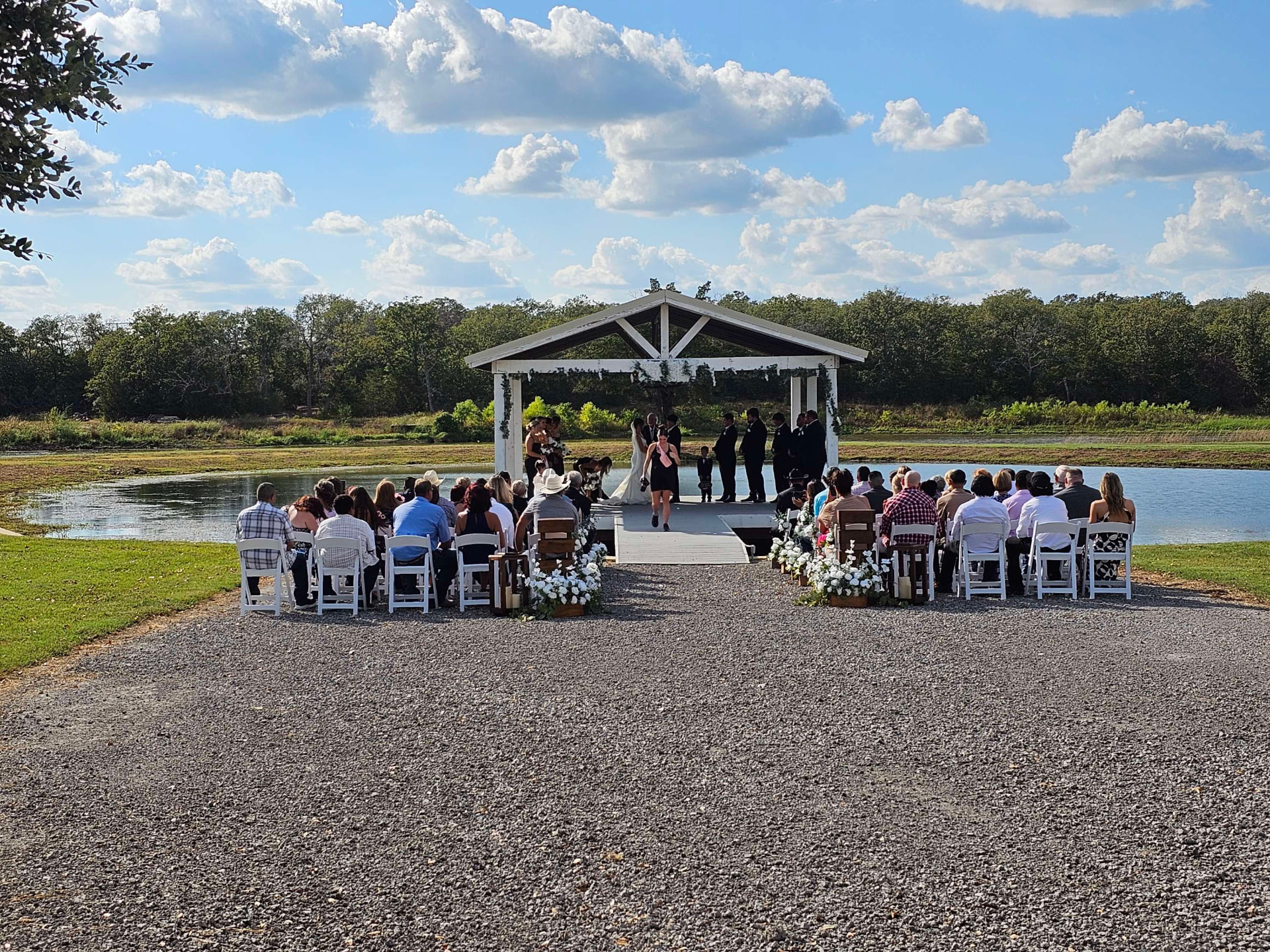 Lakeside ceremony pavilion at Reverie at Diamond D, a Texas event venue for weddings, quinceañeras, retreats and celebrations